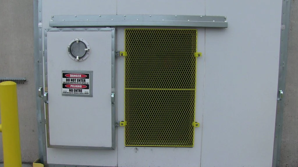 Ventilation Screen A removable screen/guard that can be placed in the access door opening when ventilation is needed. Made of 3/8” steel round rod and expanded metal. Painted safety yellow.